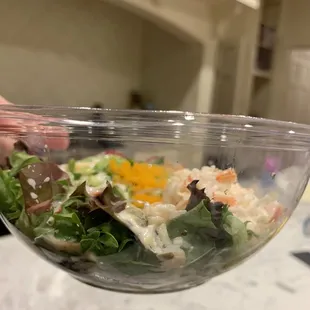 Poke bowl. Less than half the bowl is filled