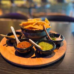 Chips and salsa for the table. Chips are heavy and salsa wasn&apos;t very flavorful but it was a pretty presentation