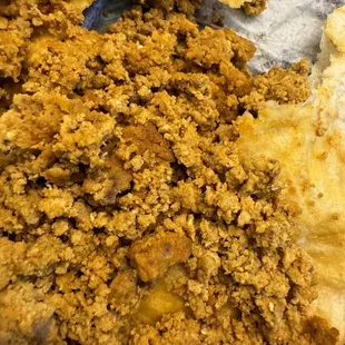 a close up view of a piece of bread with a bite taken out of it