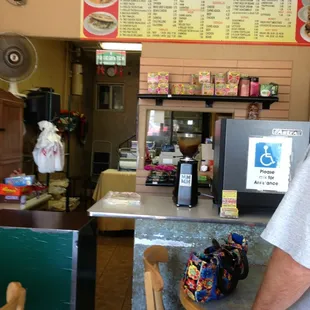 a man standing at the counter