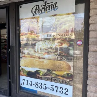 Outside, on the shop window