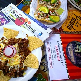 Chorizo topped Cheese Dip and Cheviche tostada absolutely Love