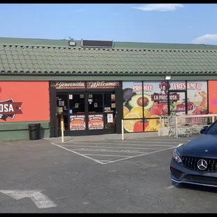 a car parked in front of the store