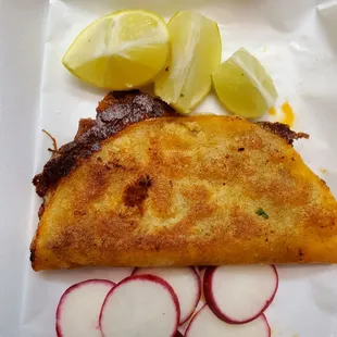 Quesa tacos are delicious with consume juice.