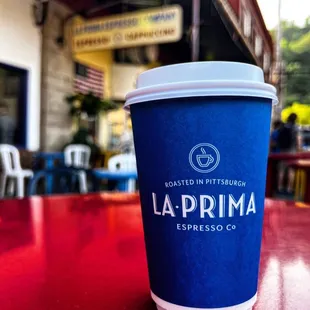 a cup of coffee on a table