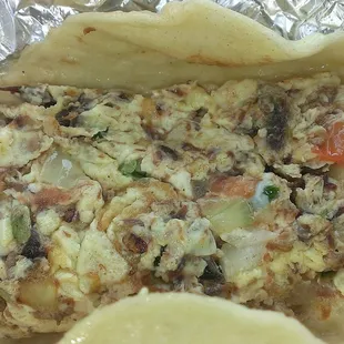 Machacado (shredded dried beef) and egg taco.