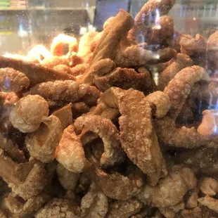Chicharrons  In front with no meat, but order from the counter in back and there&apos;s meat attached on those