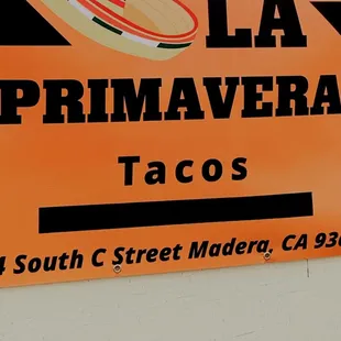 a sign for a taco shop