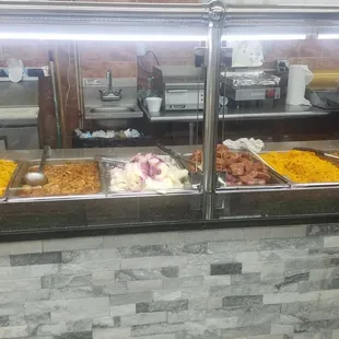 Another Section of the buffet trays. It's not serve yourself.