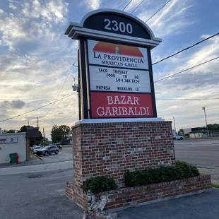 a sign in a parking lot