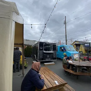 a man sitting at a picnic table