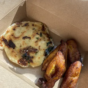 Pupusa Combo with queso, spinach, and mushroom! Not pictured: Slaw, Beans, Sauce, and Crema.