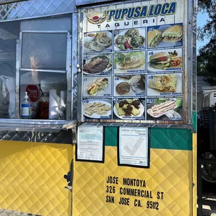 a food truck with menus