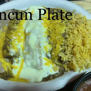 Cancun Plate also comes with a chicken taco and a guacamole tostada