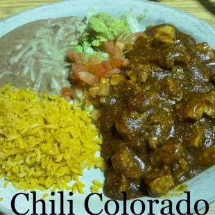 Chili Colorado, served with rice, refried beans and guacamole.  Delicious!