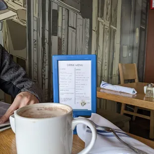 Mocha in front of drink menu