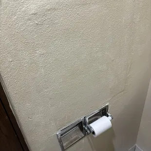 Broken toilet dispenser and magic mystery hole