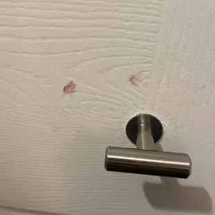 Blood on the door.