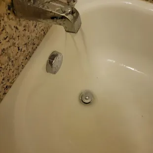 Bath/shower: the pin would not pull all the way so water pressure was horrible. The tub also didn't drain well.