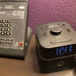 Hair and dust on phone and clock