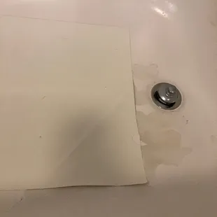 Tub with paint chips coming off.