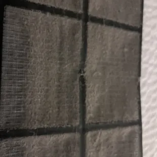 Dirty room HVAC filter...completely filthy. Could not see through it anymore