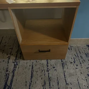 The closest thing to a dresser. One drawer on the floor.