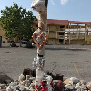 Some poor soul died in the motel parking lot.