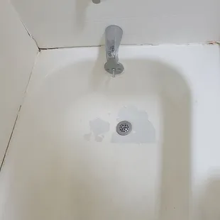 Old peeling bathtub
