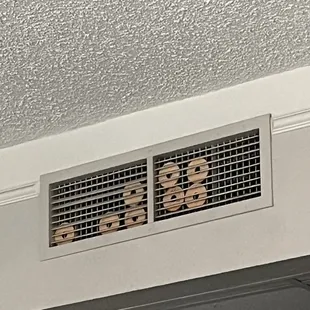 Air fresheners stuffed into fan