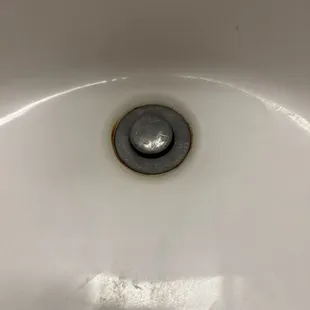 Disgusting bathroom sink drain.