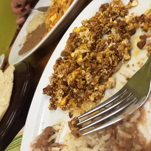 Chorizo and eggs! My girlfriend got Chilaquiles and it is yummy! The homemade tortillas are the one though.