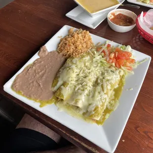 Chicken Enchilada with Green Sauce, Beans and Rice.