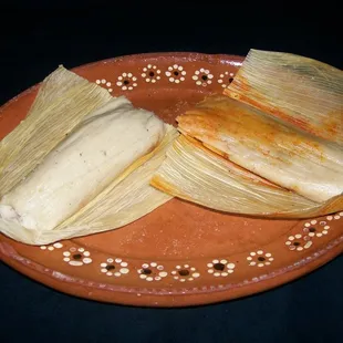 red chicken tamales and pork in green sauce $2.00 ea