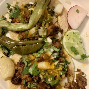 Support the local spots! Pastor Tacos w lime, grilled onions &amp; radishes $2.00