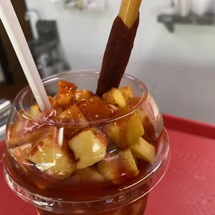 a dessert in a plastic cup
