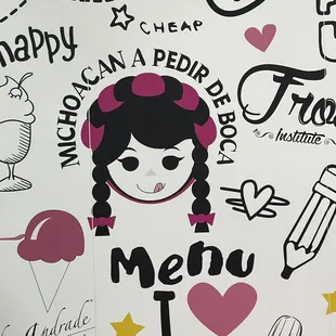 a wall with stickers on it