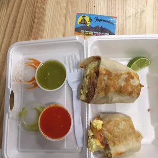 Breakfast burrito. This colossal beast is so amazing! Eggs, cheese, bacon, pico de gallo and beans in a fresh grilled tortilla!