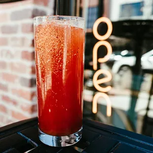 MANGONADA  Mango puree, Tajin, Scarlet Tea, Topo