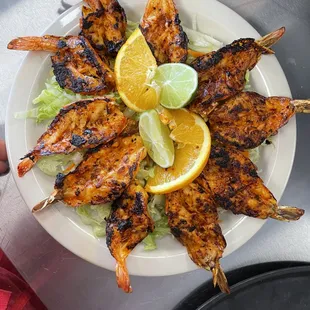 a plate of grilled shrimp
