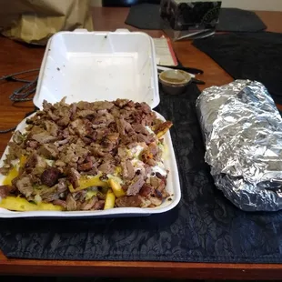 Small asada fries.. chicken burrito.  Wow look at the sizes.