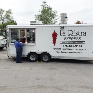 a food truck parked in a parking lot