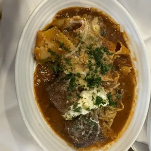 Pappardelle, wide ribbon fresh pasta and short rib, ricotta cheese