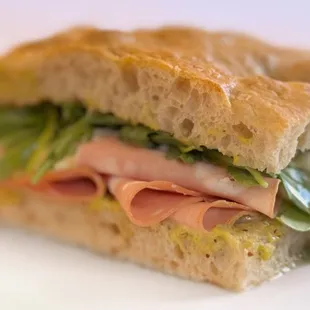 The &quot;Morty&quot; Italian sandwich on house-baked focaccia, filled with mortadella, creamy burrata, extra virgin olive oil, pistachio cream, honey