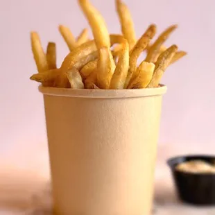 Crispy sea-salted fries, topped with thyme and rosemary, served with a rich truffle parmesan sauce for dipping.