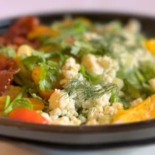 &quot;Derby Salad&quot; with lettuce, Italian prosciutto, blue cheese, cherry tomatoes, eggs, fresh herbs. Served with Ranch dressing.