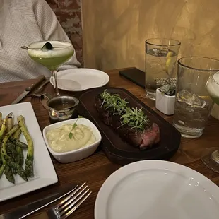 Bife, grilled asparagus, garlic mashed potatoes, concombre martinis