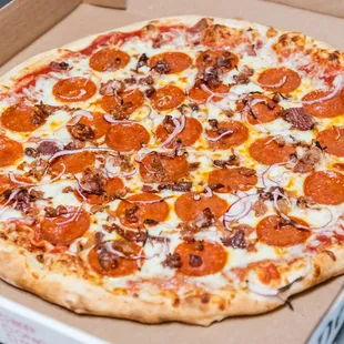 a pepperoni pizza in a box