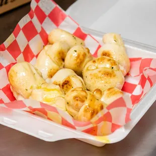 a basket of doughnuts on a table