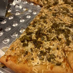 RJ&apos;s pizza plus green olives.